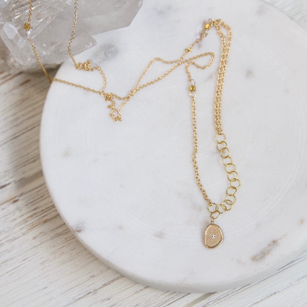 
                      
                        NKL-18K Small Gold 'Stardust' Necklace
                      
                    