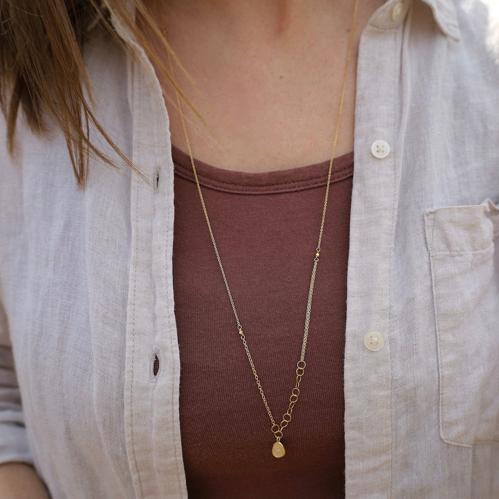 
                      
                        NKL-18K Small Gold 'Stardust' Necklace
                      
                    