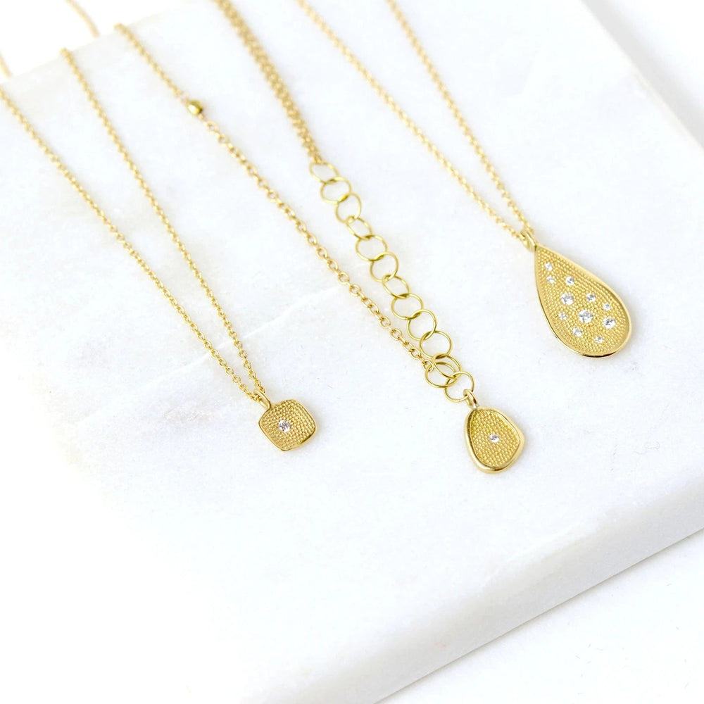 
                      
                        NKL-18K Small Gold `Stardust` Necklace
                      
                    