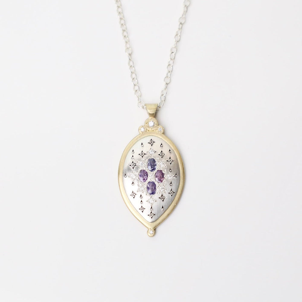 
                  
                    NKL-18K Two Tone Oval Sapphire Pendant
                  
                