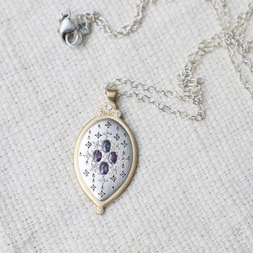 
                  
                    NKL-18K Two Tone Oval Sapphire Pendant Necklace
                  
                