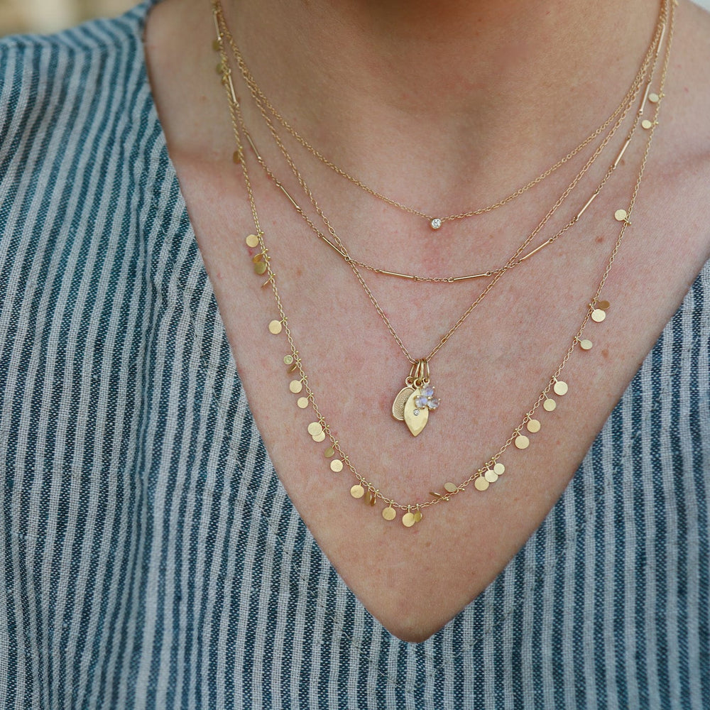 
                      
                        NKL-18K Yellow Gold Long Random Dots Necklace
                      
                    