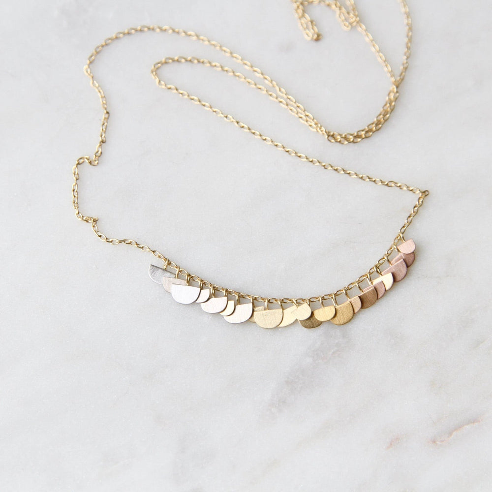 
                      
                        NKL-18K Yellow Gold & Rainbow Gold Sunrise Arc Necklace
                      
                    