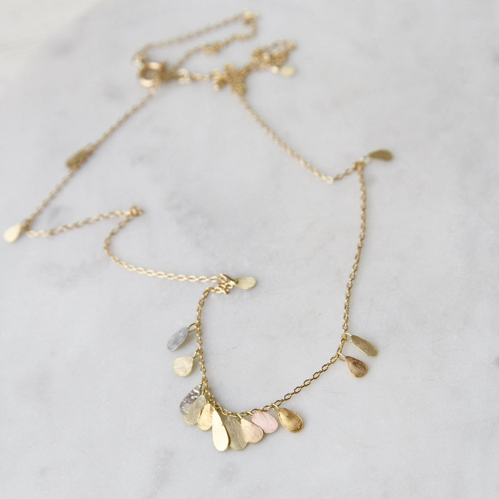 
                      
                        NKL-18K Yellow Gold & Rainbow Gold Tiny Raindrops Necklace
                      
                    