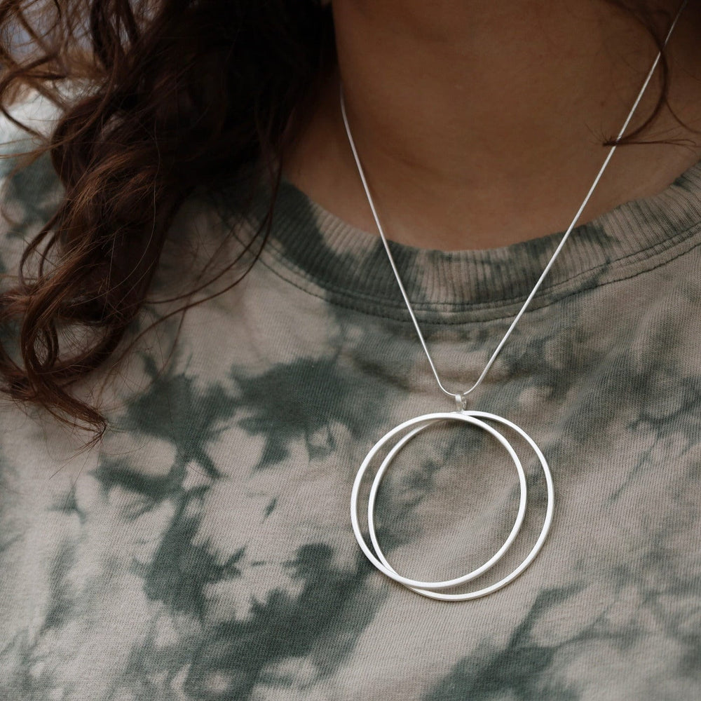 
                      
                        NKL 2 Ring Pendant Necklace
                      
                    