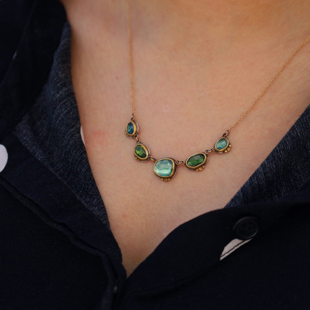 
                      
                        NKL-22K Bezel Set Multi Green Tourmaline Necklace
                      
                    