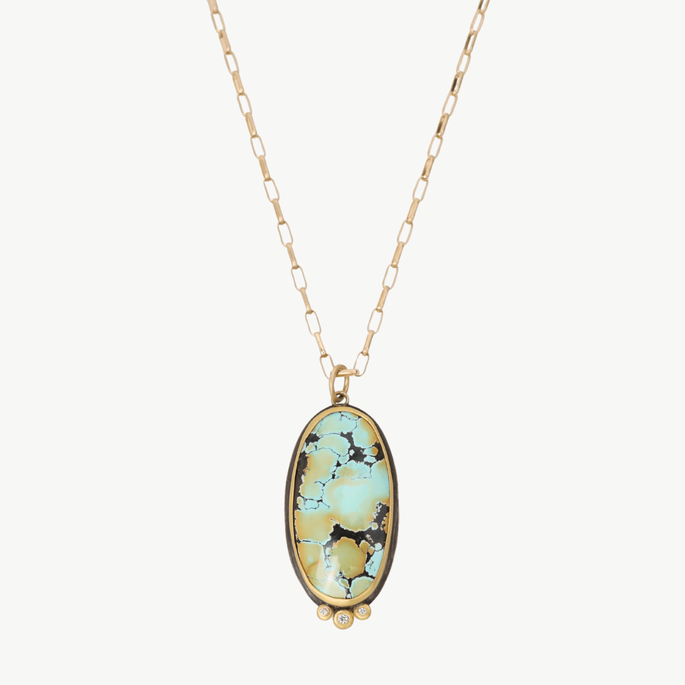 NKL-22K Oval Turquoise Necklace with Diamond Trio