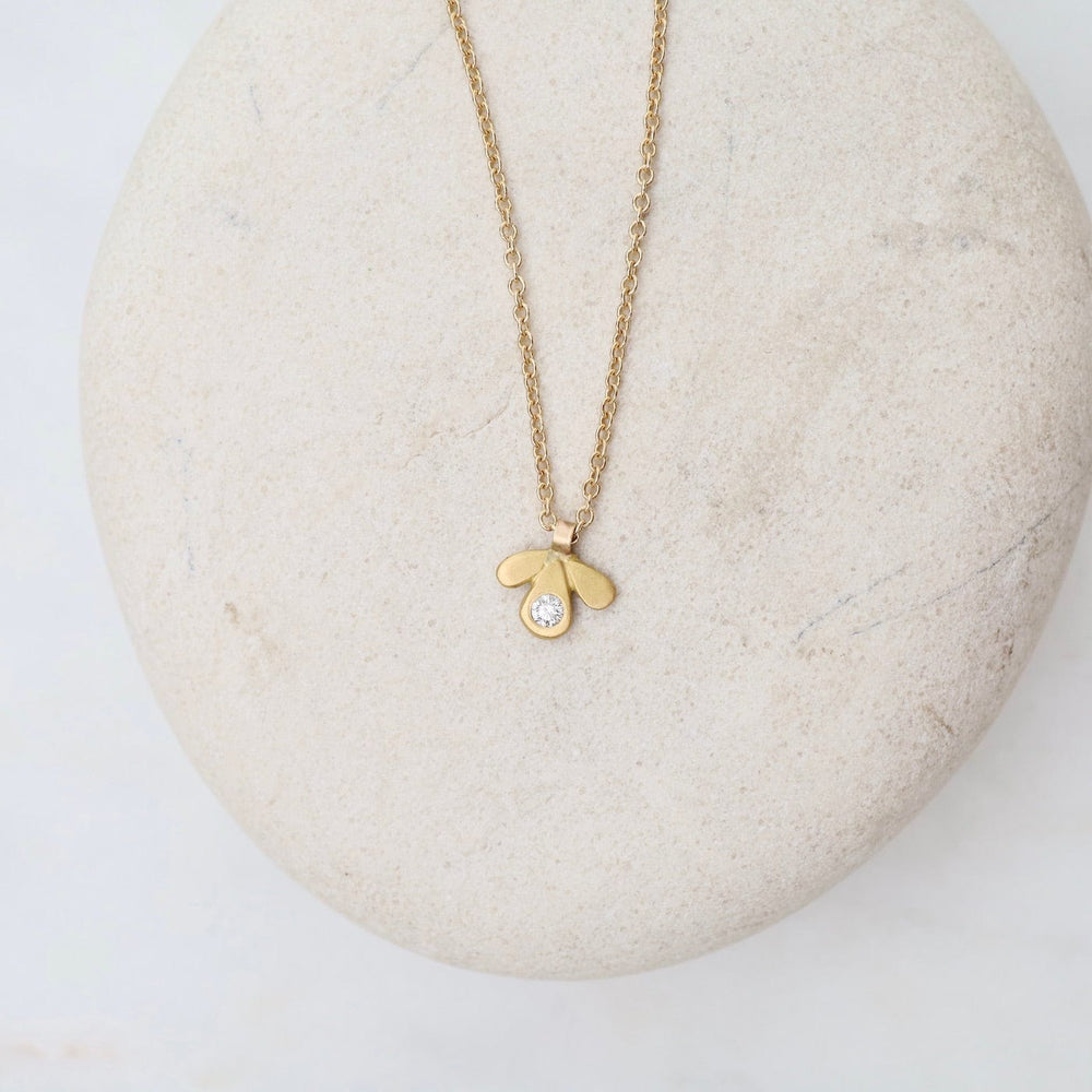 
                  
                    NKL-22K Tiny Gold Leaf Trio Necklace with Diamond
                  
                