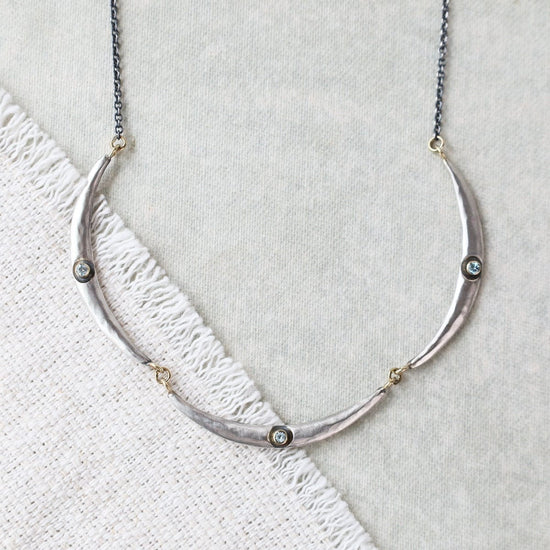NKL 3 Arc Necklace with Blue Zircon
