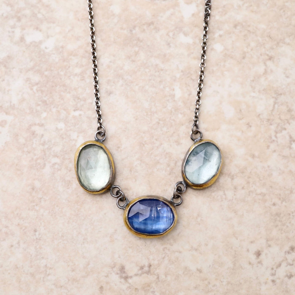 
                      
                        NKL 3 Crescent Rim Necklace with Kyanite & Aquamarine
                      
                    