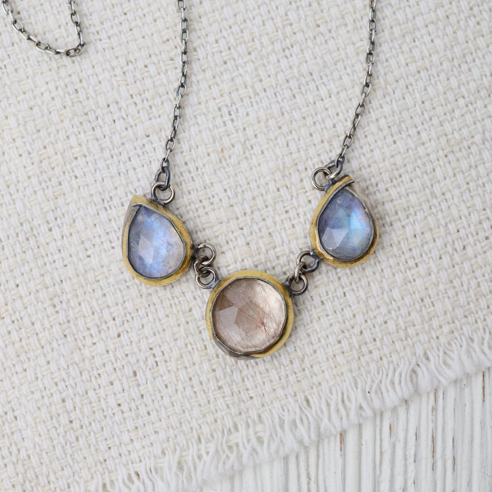 
                  
                    NKL 3 Crescent Rim Necklace with Rainbow Moonstone & R
                  
                