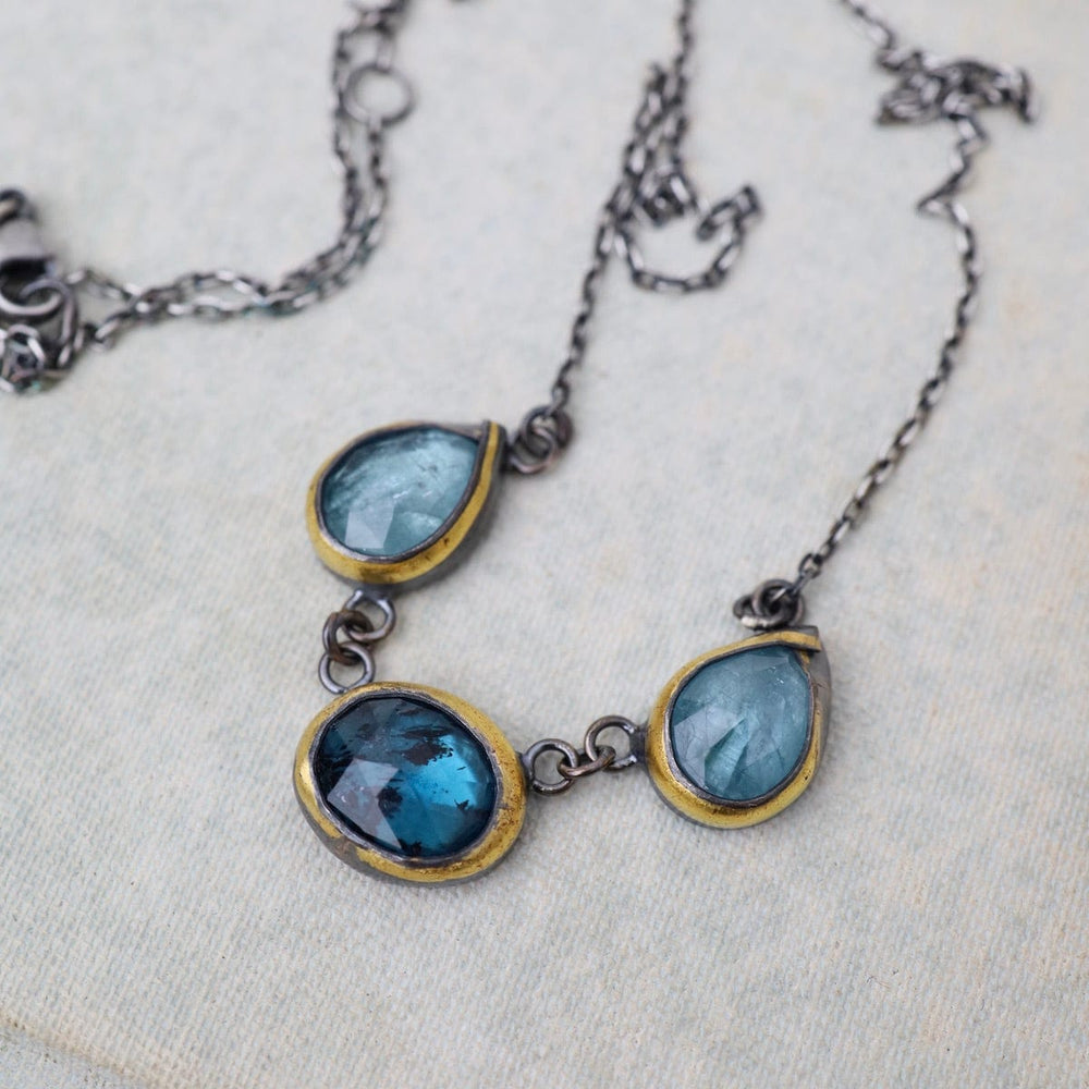 
                  
                    NKL 3 Crescent Rim Necklace with Teal Kyanite & Aquama
                  
                