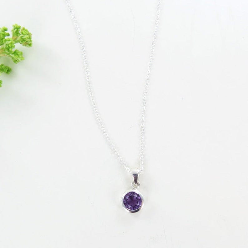 
                      
                        NKL 6.5mm Bezel Set Round Amethyst Pendant
                      
                    