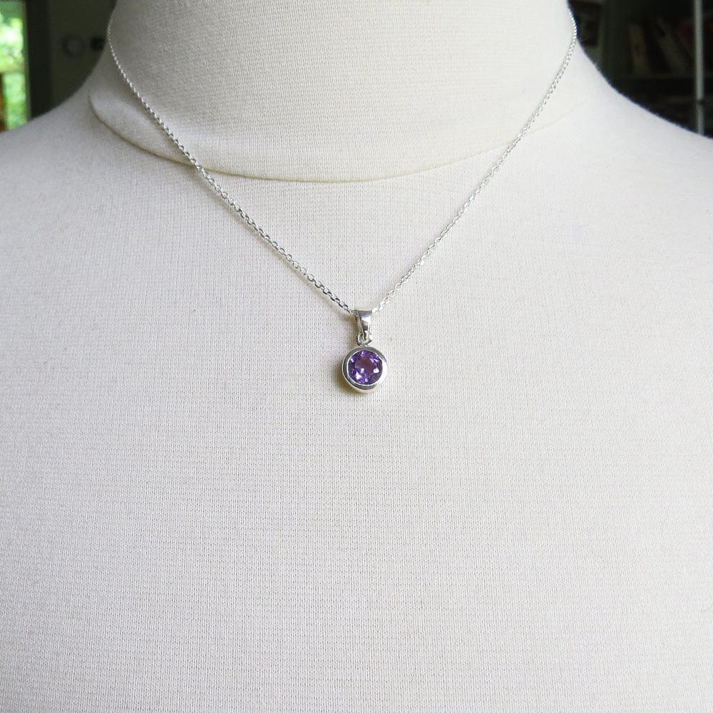 
                      
                        NKL 6.5mm Bezel Set Round Amethyst Pendant
                      
                    