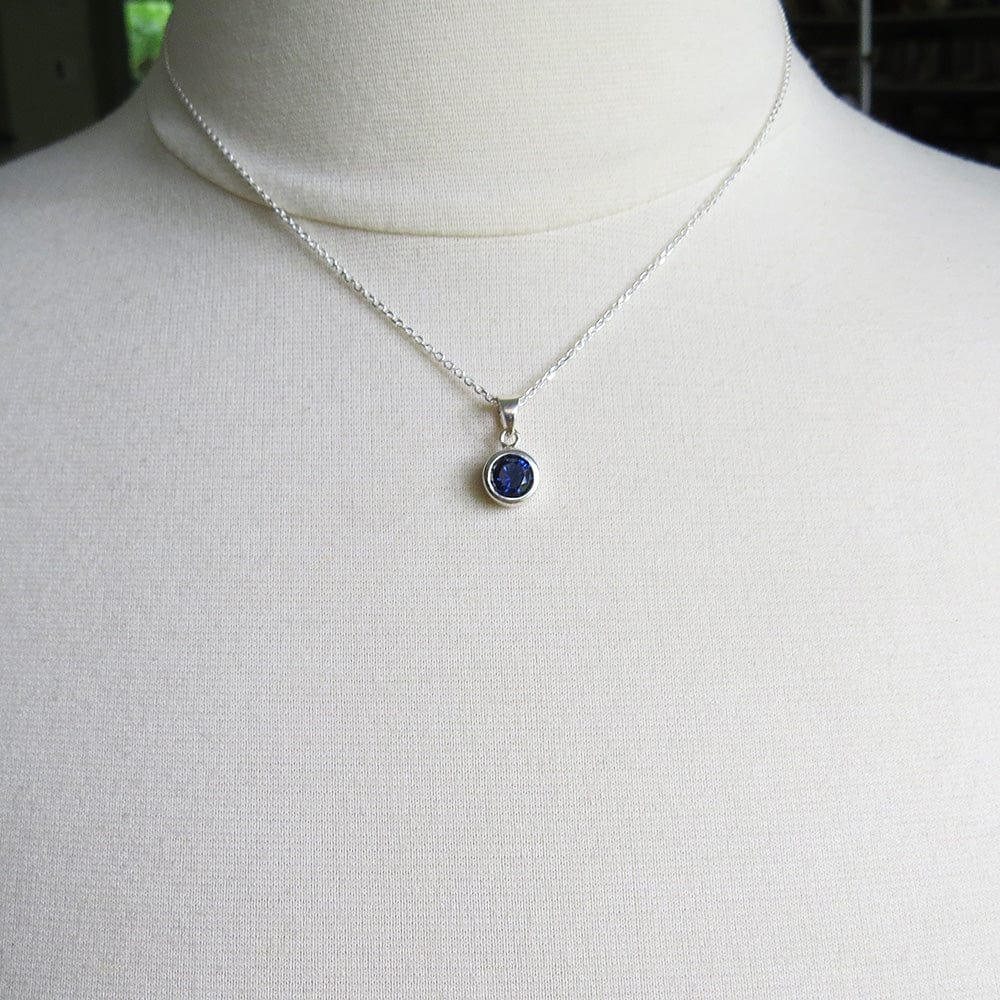 NKL 6.5mm Synthetic Sapphire Bezel Set Pendant