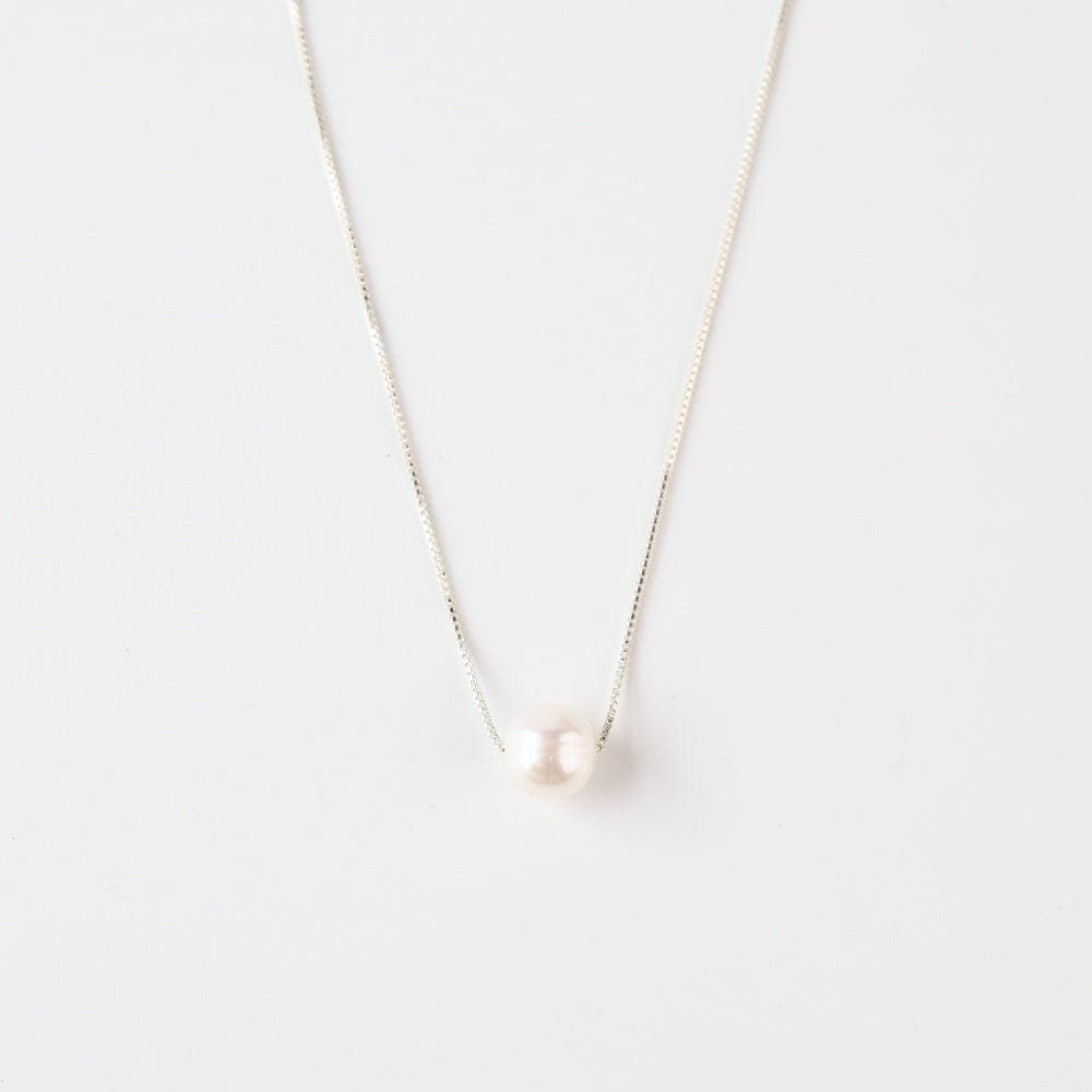 
                      
                        NKL 8mm White Pearl on Sterling SIlver Chain
                      
                    