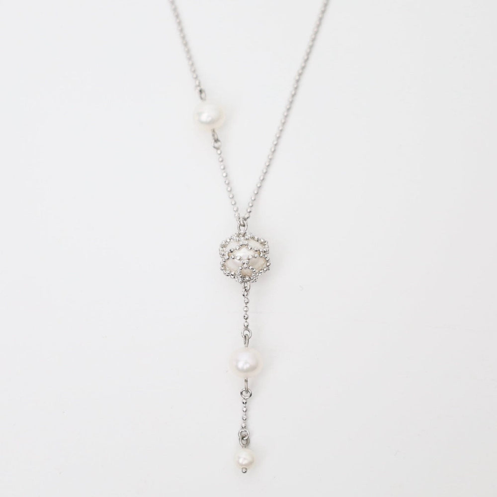 
                  
                    NKL Asymmetrical Pearl Station Necklace
                  
                