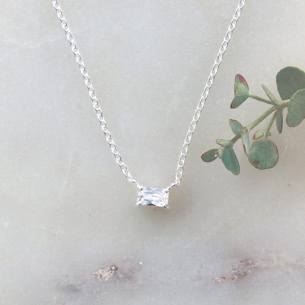 
                      
                        NKL Baguette Solitaire CZ Necklace
                      
                    