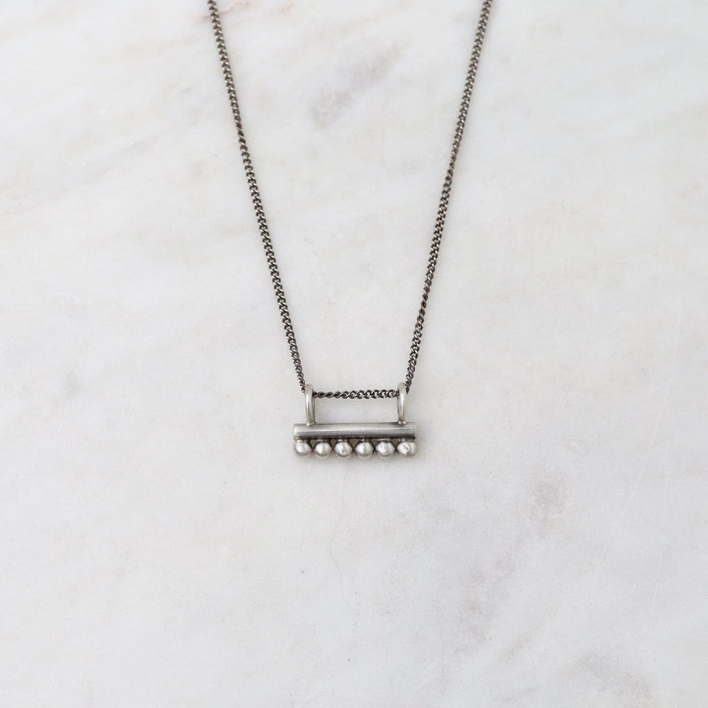 
                      
                        NKL Bar Amulet Necklace
                      
                    