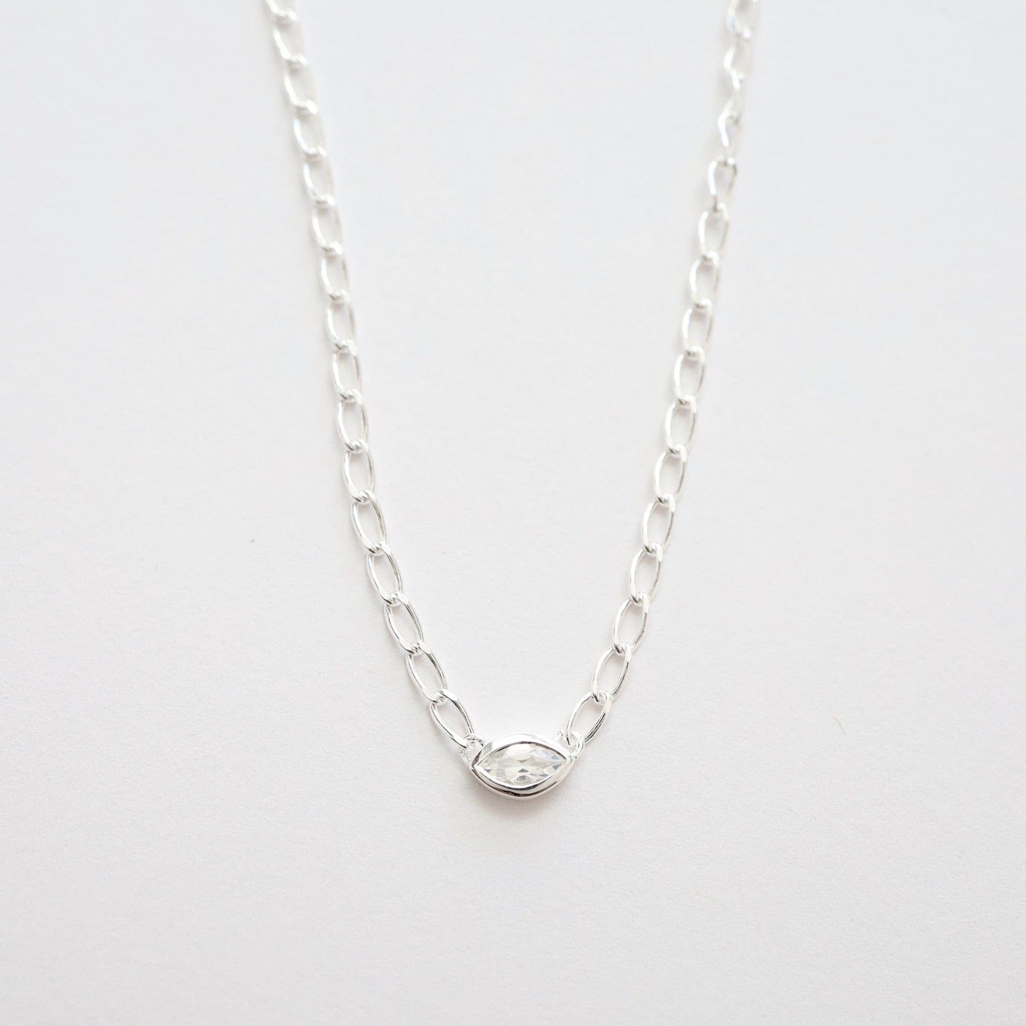 NKL Bezel Set Marquise White Topaz on Sterling Silver Cut Curb Chain