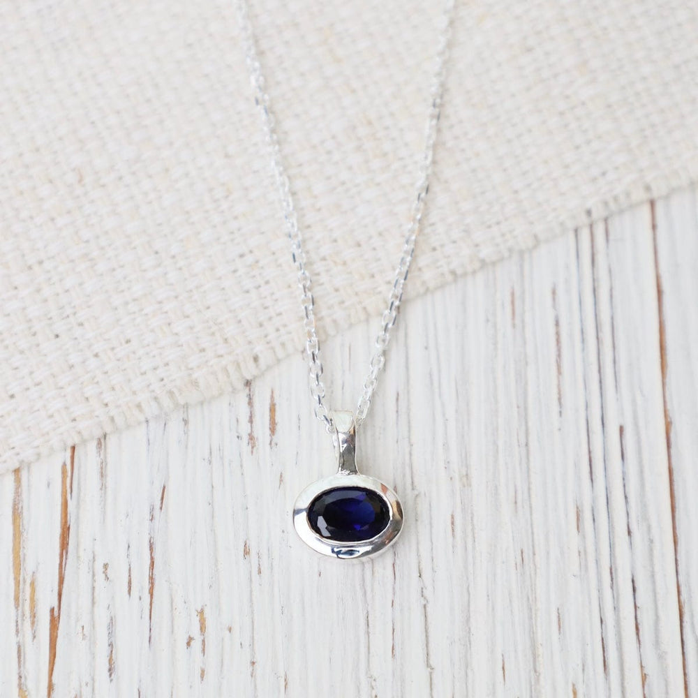 NKL Bezel Set Oval Synthetic Sapphire Pendant Necklace