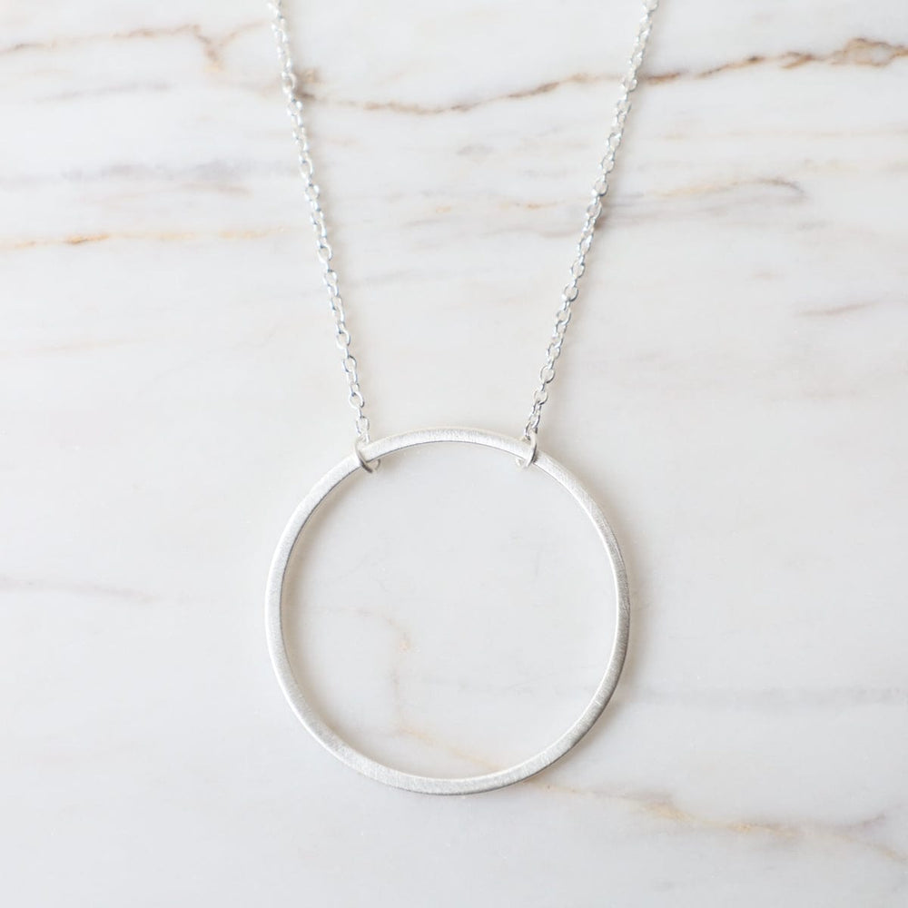 
                      
                        NKL Big Wire Circle Necklace in Brushed Sterling Silver
                      
                    