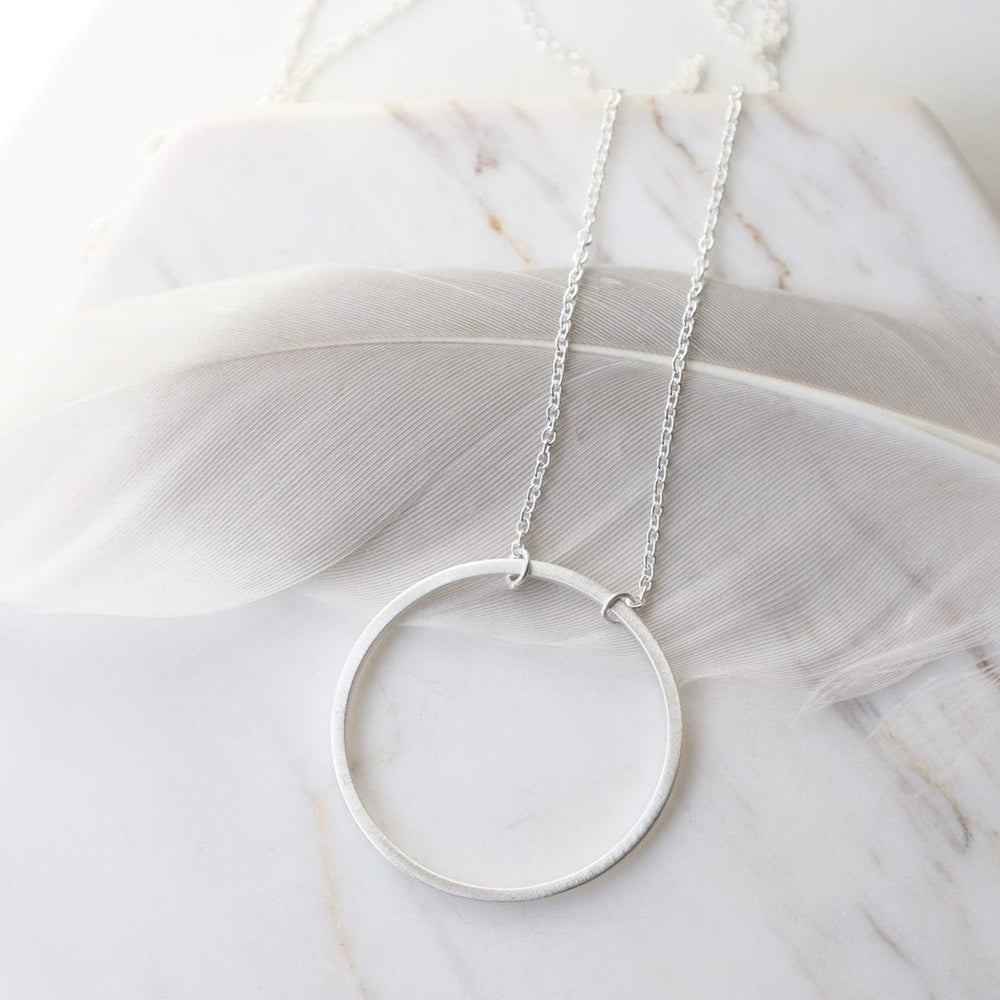 
                      
                        NKL Big Wire Circle Necklace in Brushed Sterling Silver
                      
                    