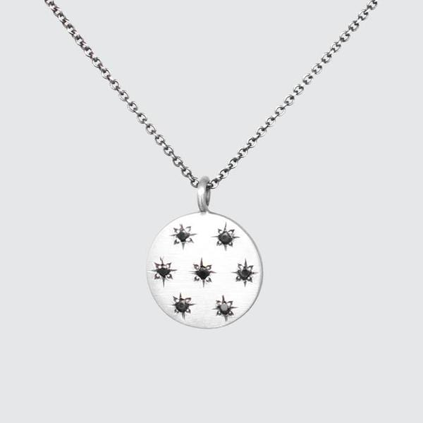 
                      
                        NKL Black Onyx Star Set Disc Necklace
                      
                    