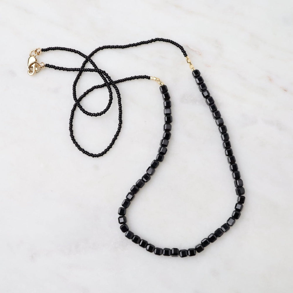 
                  
                    NKL Black Seed Bead & Onyx Cube Necklace
                  
                