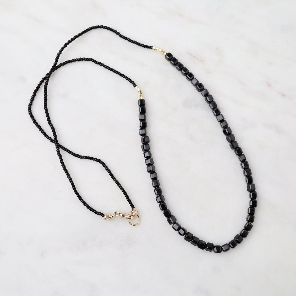 
                  
                    NKL Black Seed Bead & Onyx Cube Necklace
                  
                