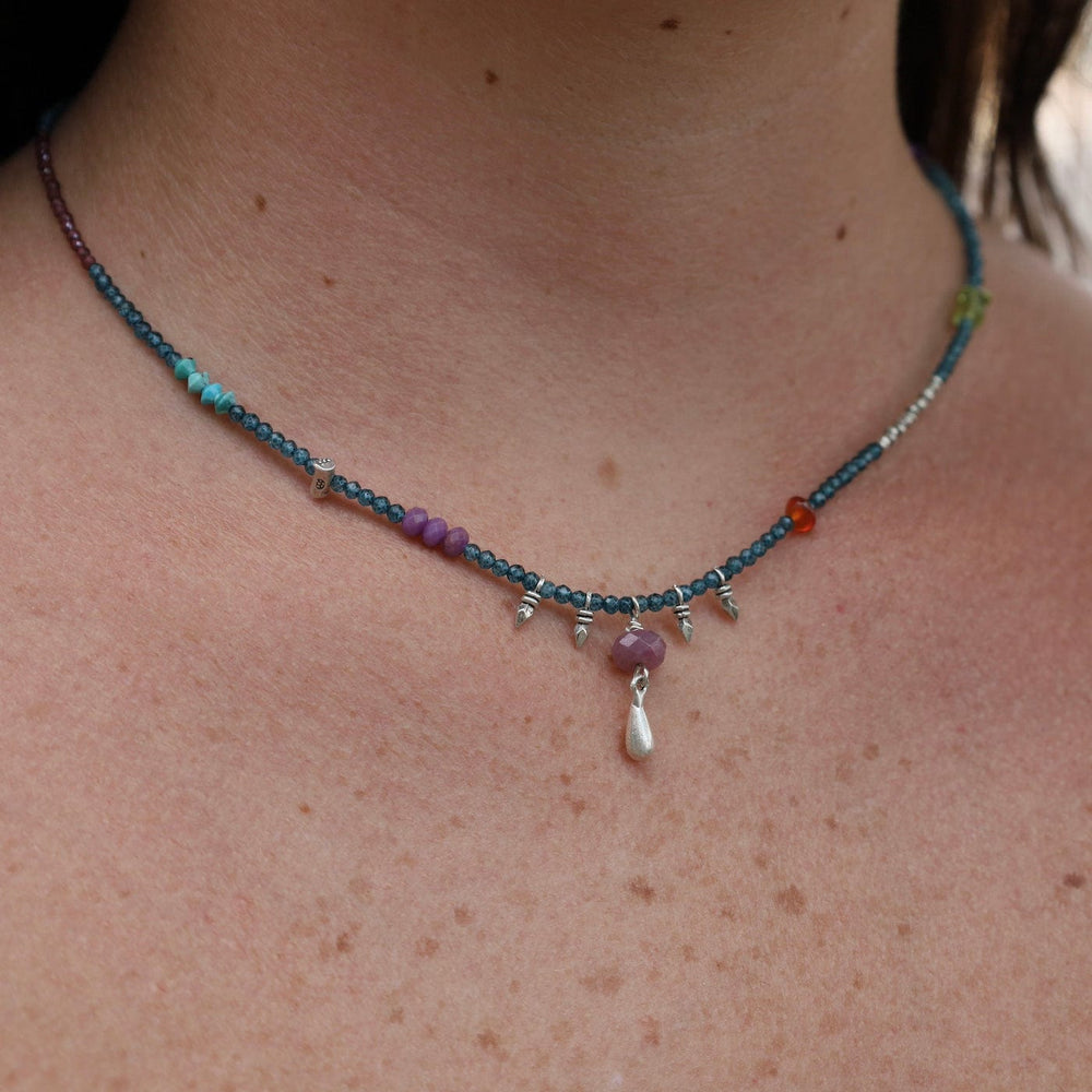 
                      
                        NKL Blue Topaz with Ruby and Silver Gum Drop Necklace
                      
                    