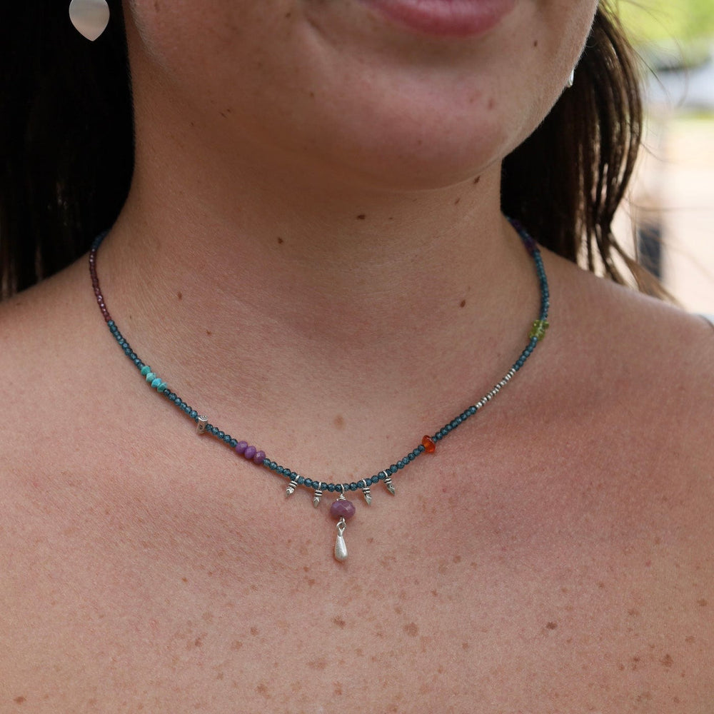 
                      
                        NKL Blue Topaz with Ruby and Silver Gum Drop Necklace
                      
                    