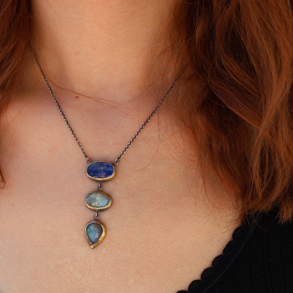 
                      
                        NKL Blues Crescent Rim Drop Necklace
                      
                    