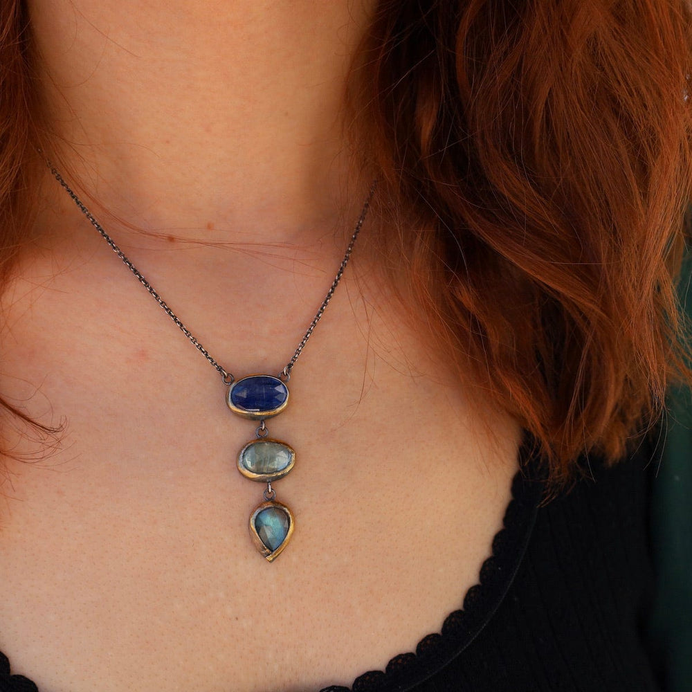 
                      
                        NKL Blues Crescent Rim Drop Necklace
                      
                    