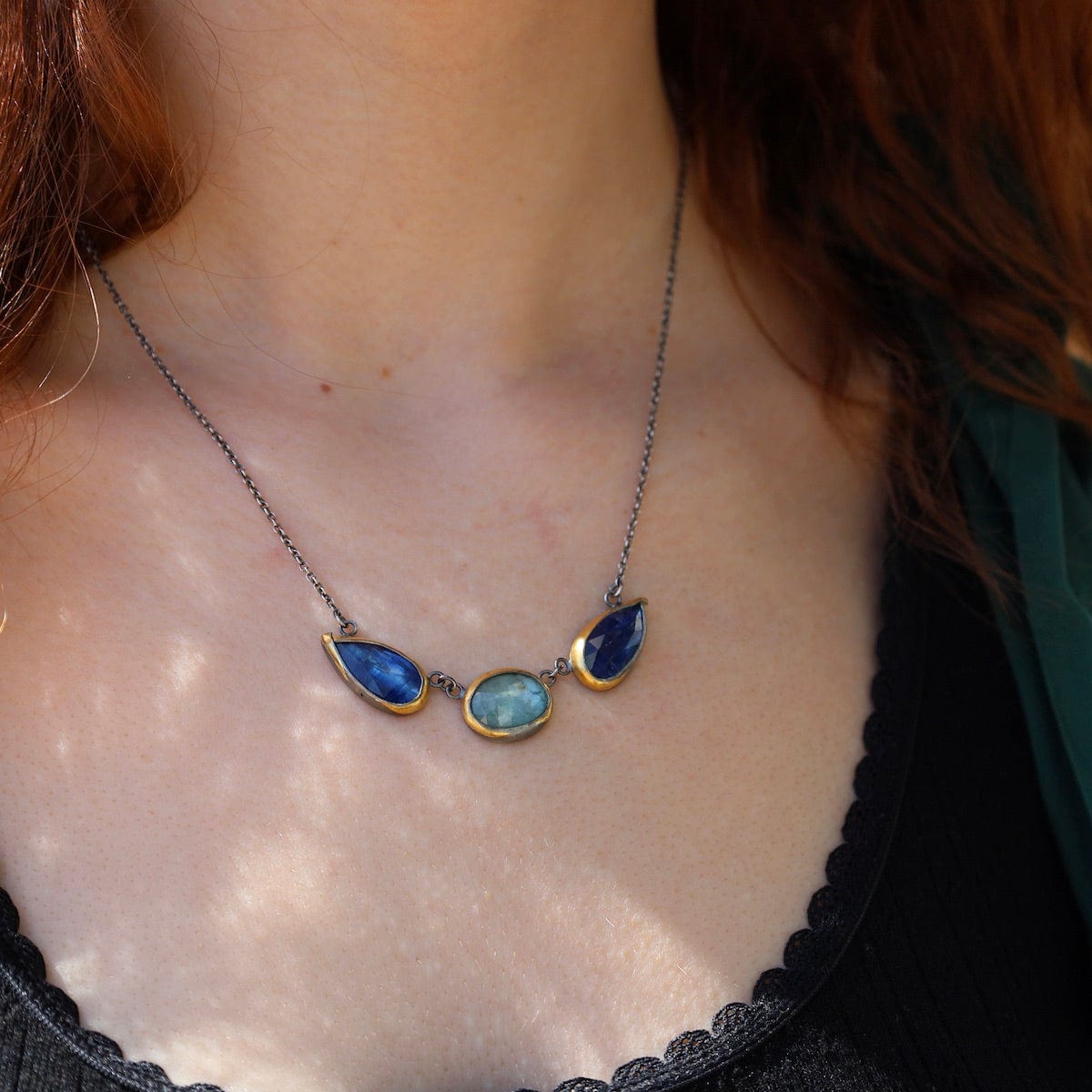 NKL Bright Blue Kyanite 3 Stone Teardrop & Oval Crescent Rim Necklace