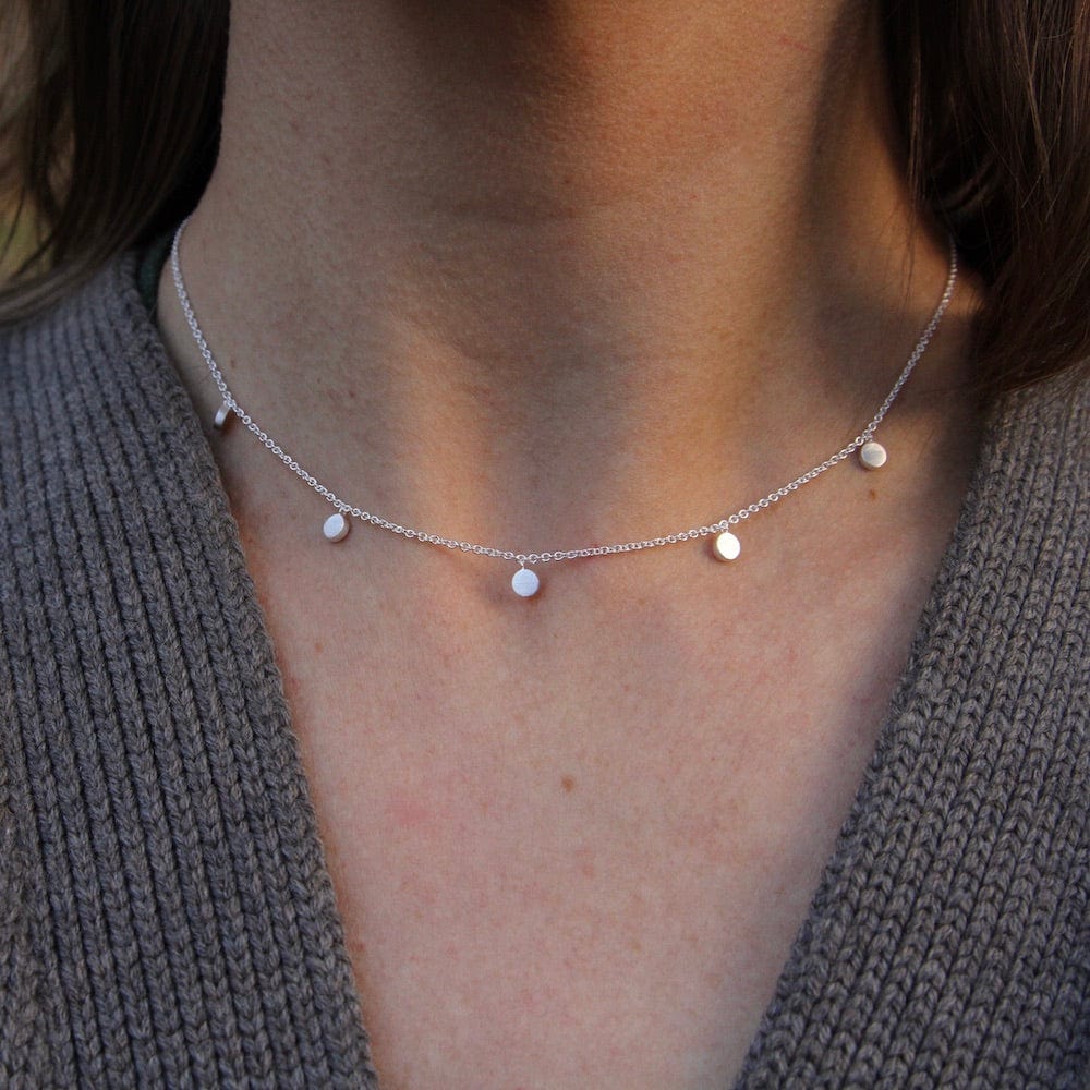 
                      
                        NKL Brushed Sterling Silver Confetti Necklace
                      
                    