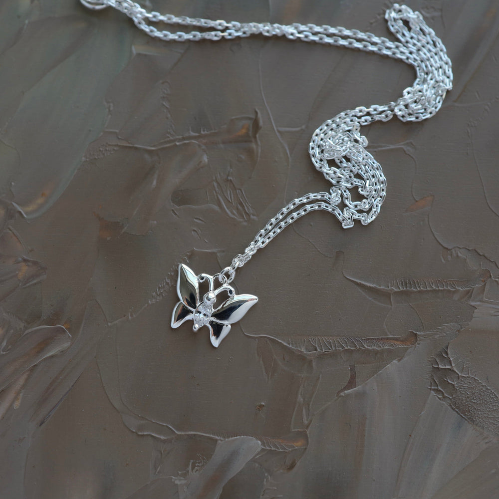 
                  
                    NKL Butterfly with Single CZ in Sterling Silver
                  
                