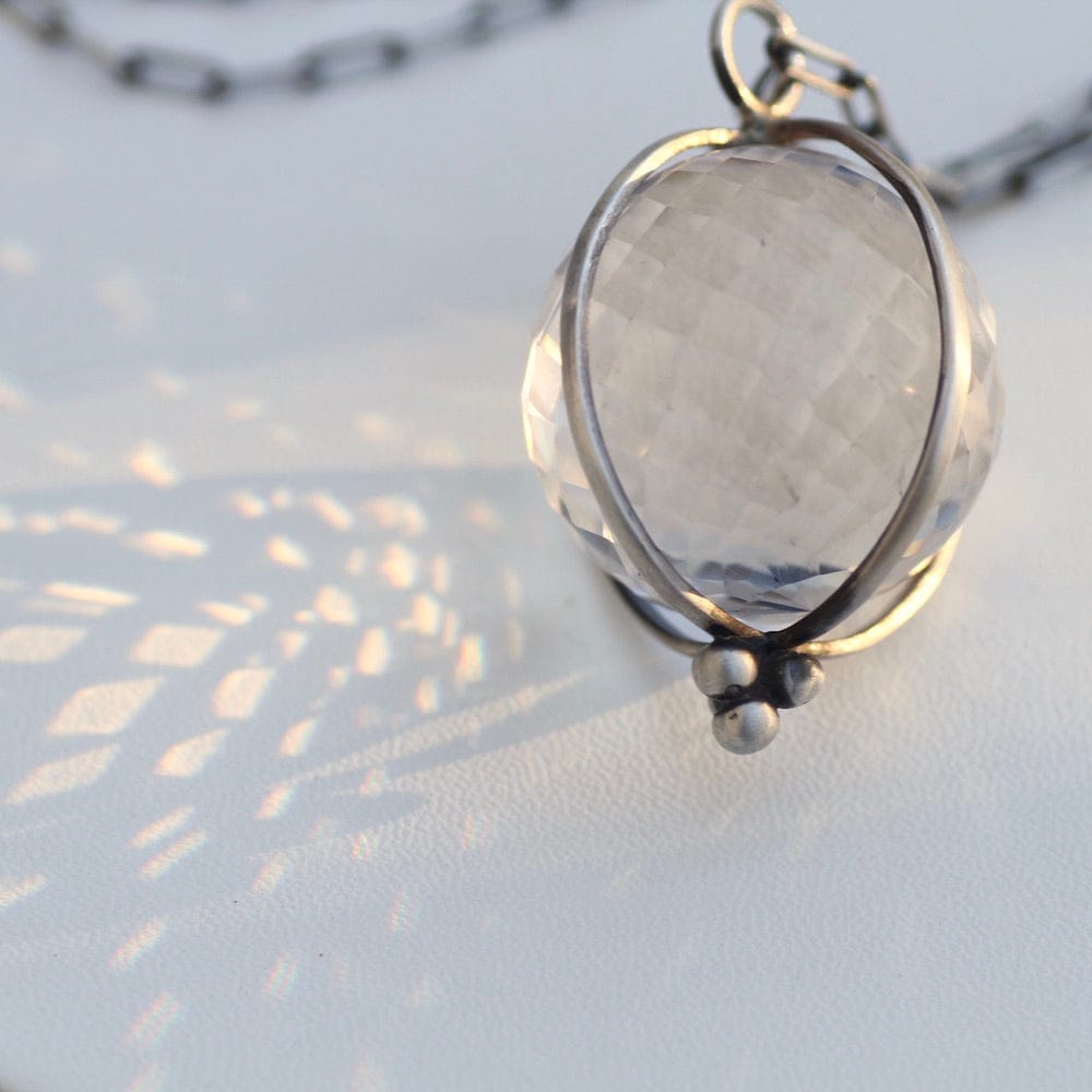 
                      
                        NKL Caged Faceted Quartz Crystal Ball on Oxidized Cable Chain
                      
                    