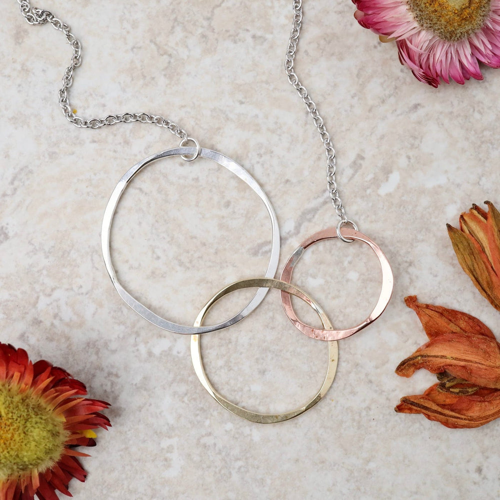 
                      
                        NKL Calming Circles Necklace
                      
                    