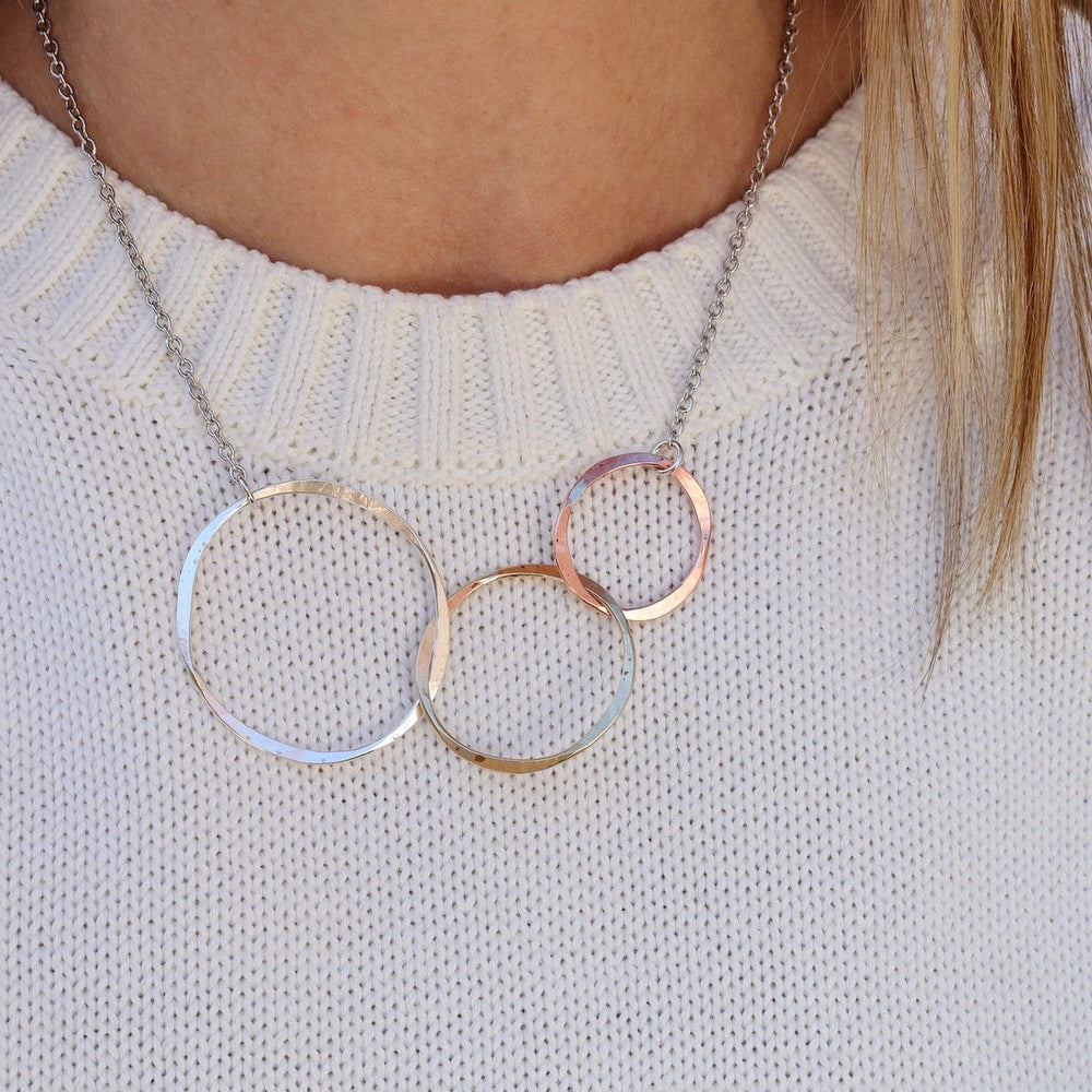 
                      
                        NKL Calming Circles Necklace
                      
                    