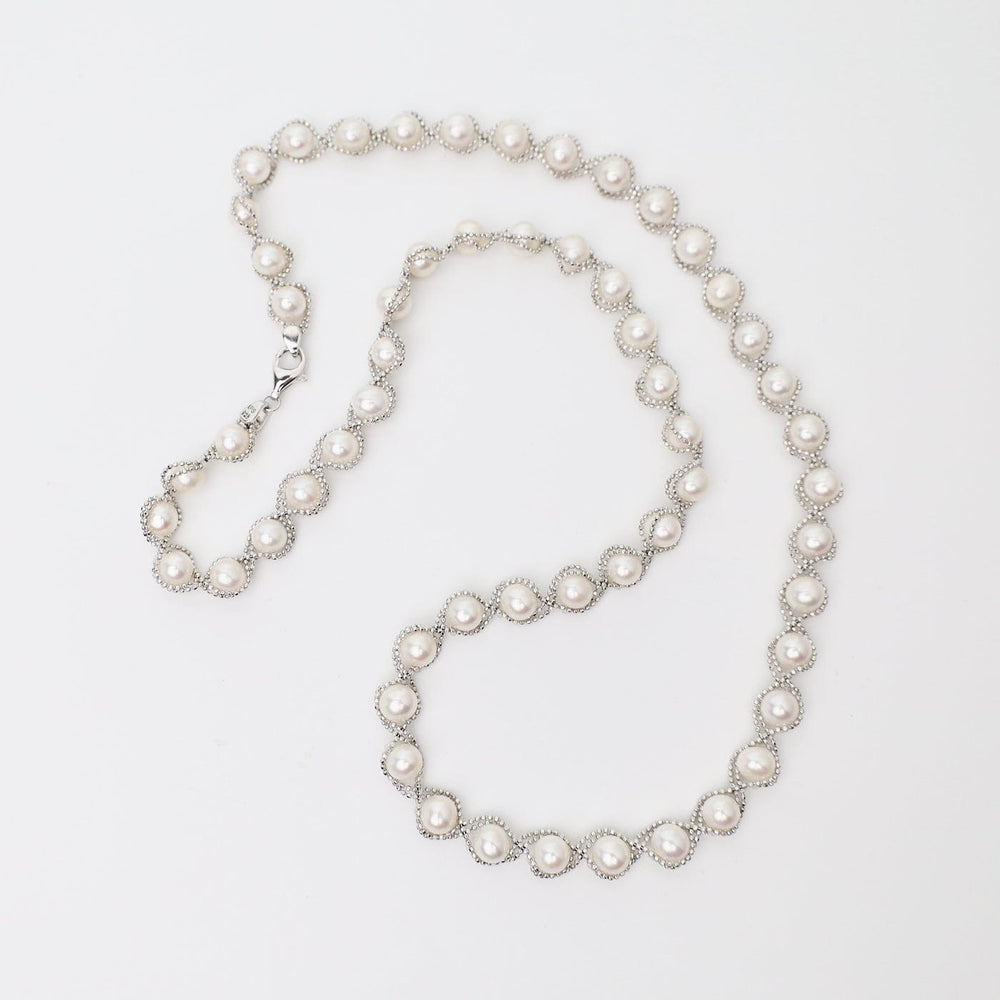 
                  
                    NKL Captured Pearl Necklace
                  
                