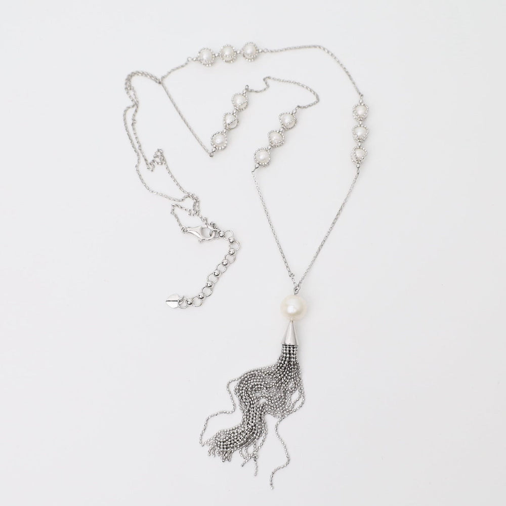 
                  
                    NKL Captured Pearl Stations with Tassel Necklace
                  
                