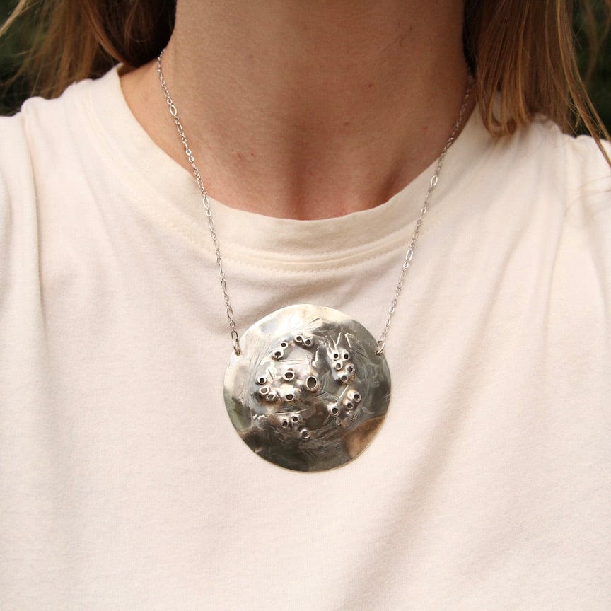 
                  
                    NKL Celestial Silver Disc Necklace
                  
                