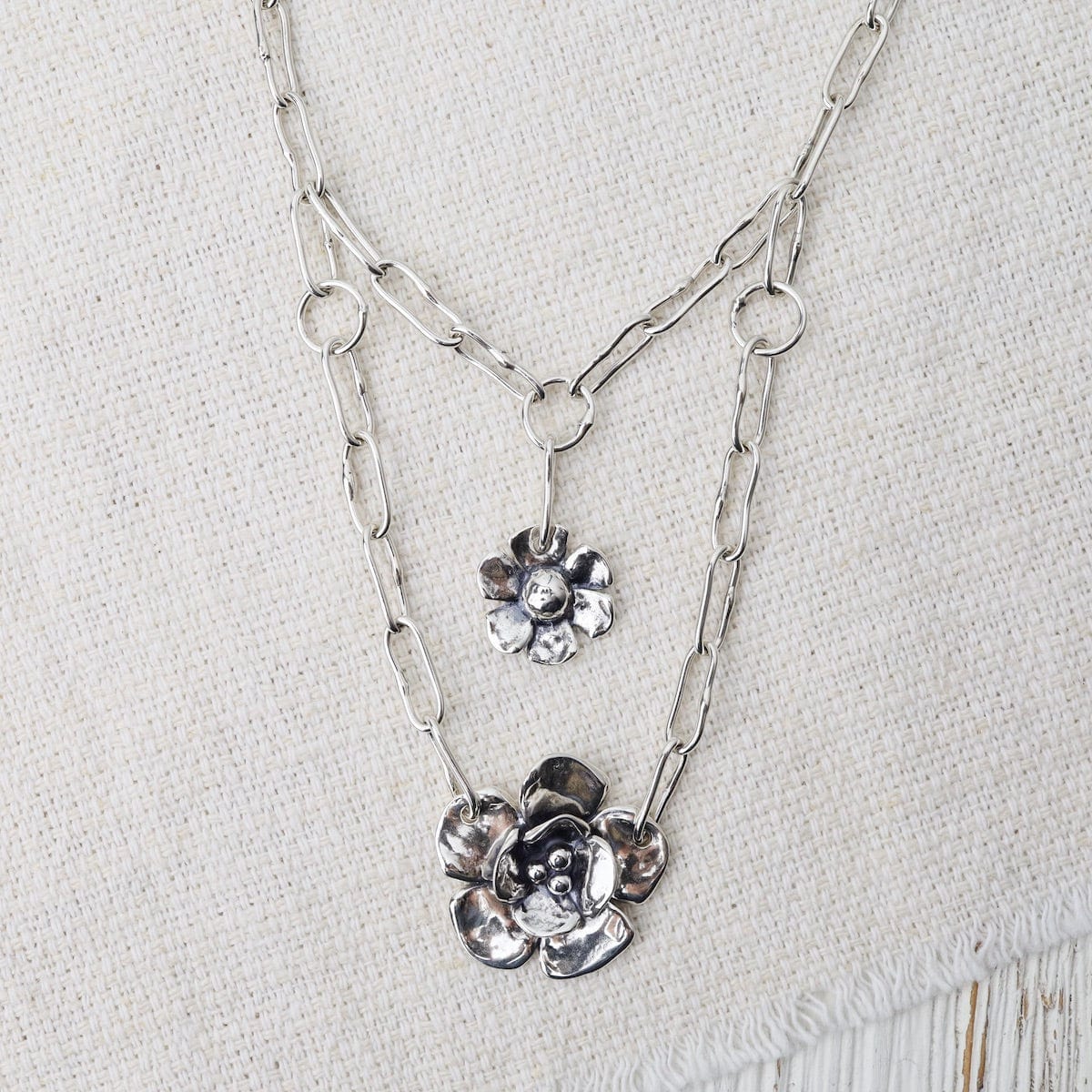 NKL Chain Layer Necklace With Daisy & Double Dogwood on Short Oval Chain
