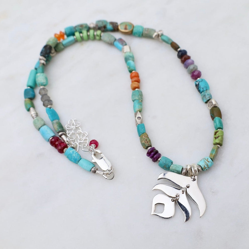 
                      
                        NKL Chunky Turquoise with Silver Peacock Feather Necklace
                      
                    