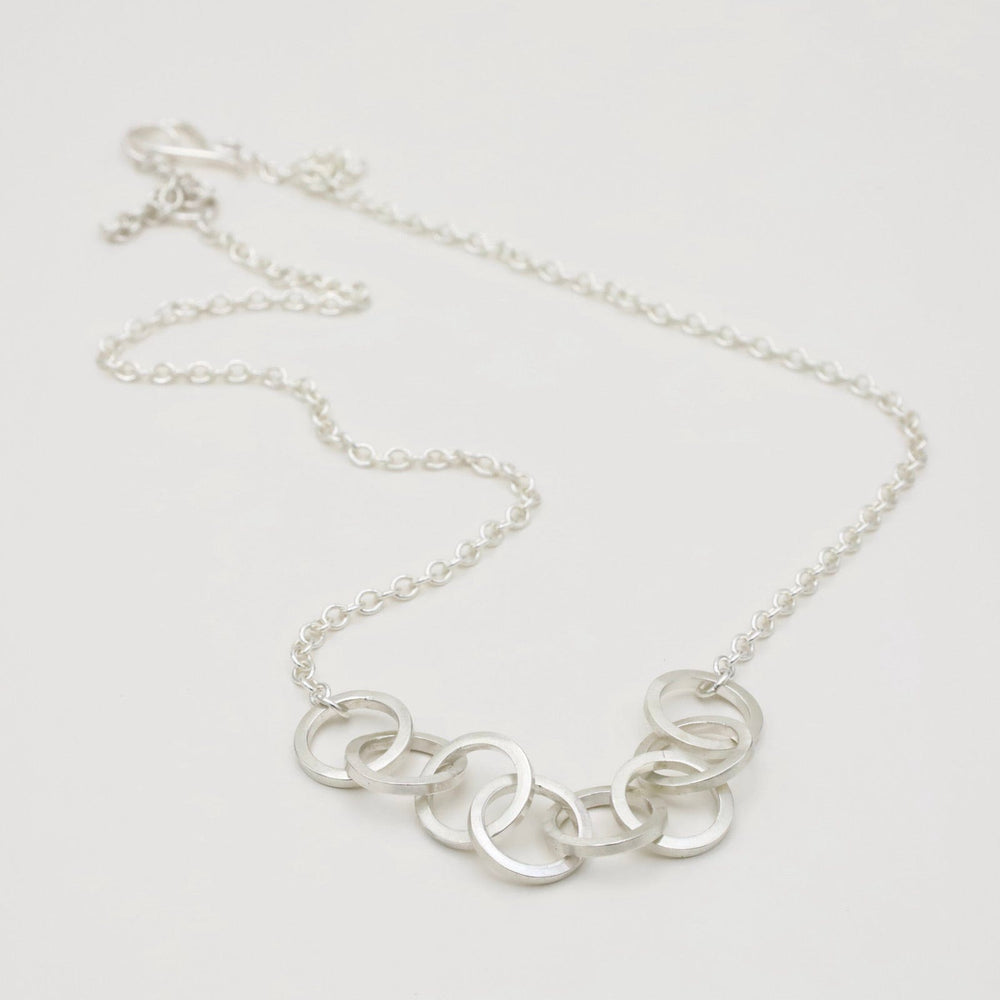 
                  
                    NKL Circle Link Chain Necklace in Polished Silver
                  
                