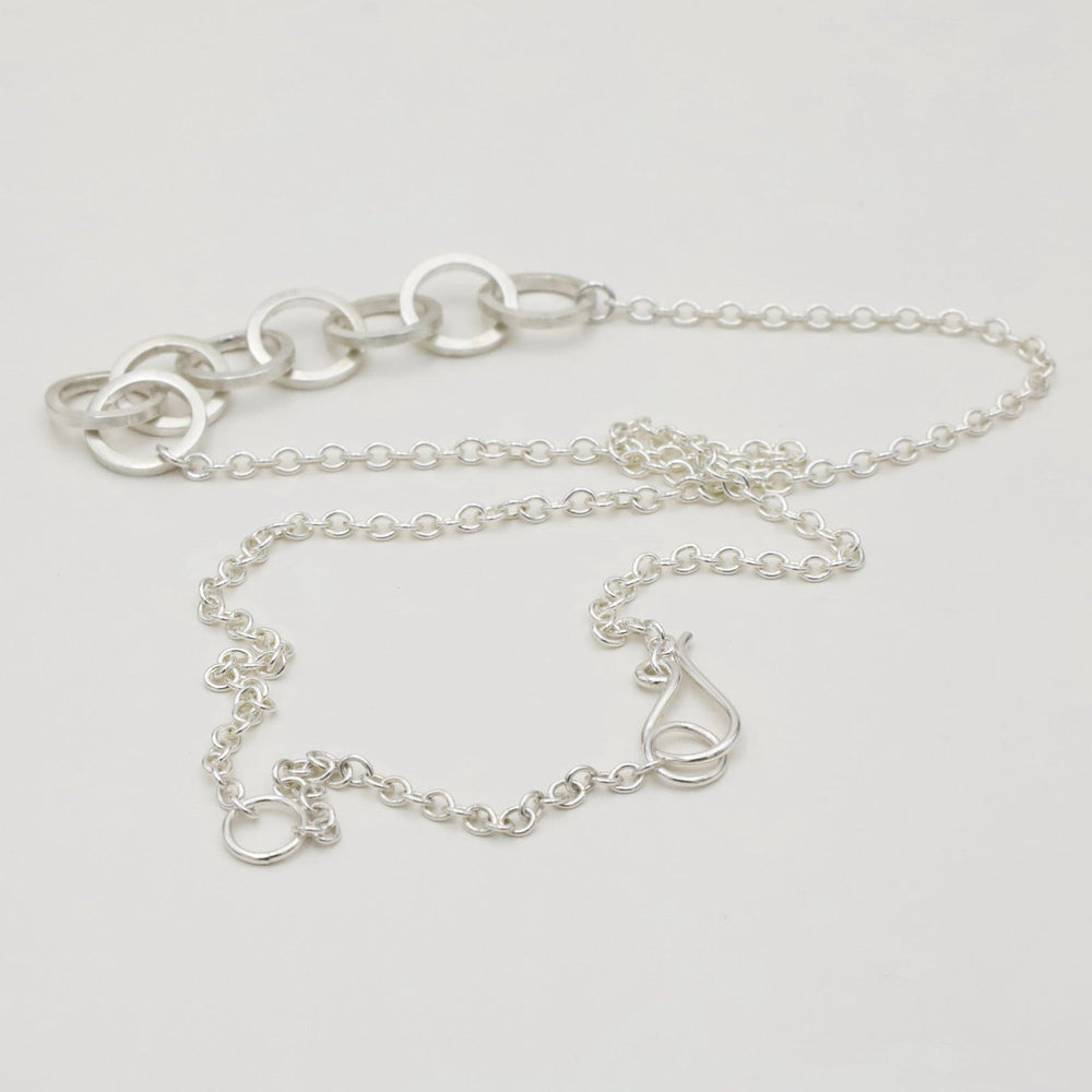 
                  
                    NKL Circle Link Chain Necklace in Polished Silver
                  
                