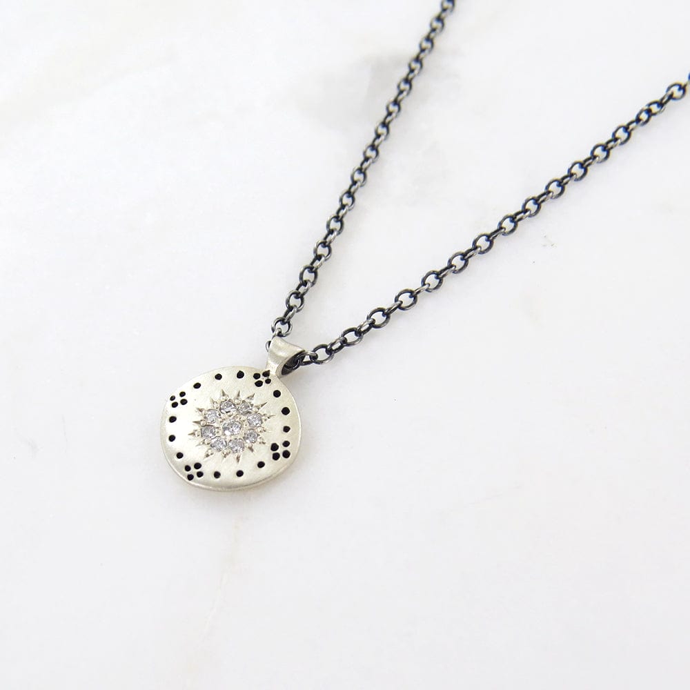 
                      
                        NKL Cluster Pendant in Diamond
                      
                    