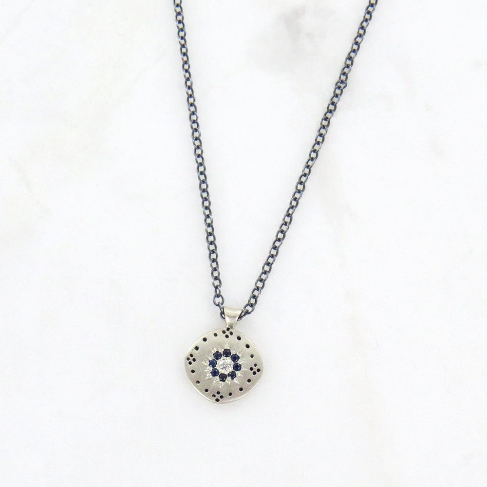 
                      
                        NKL Cluster Pendant with Sapphire Floret
                      
                    