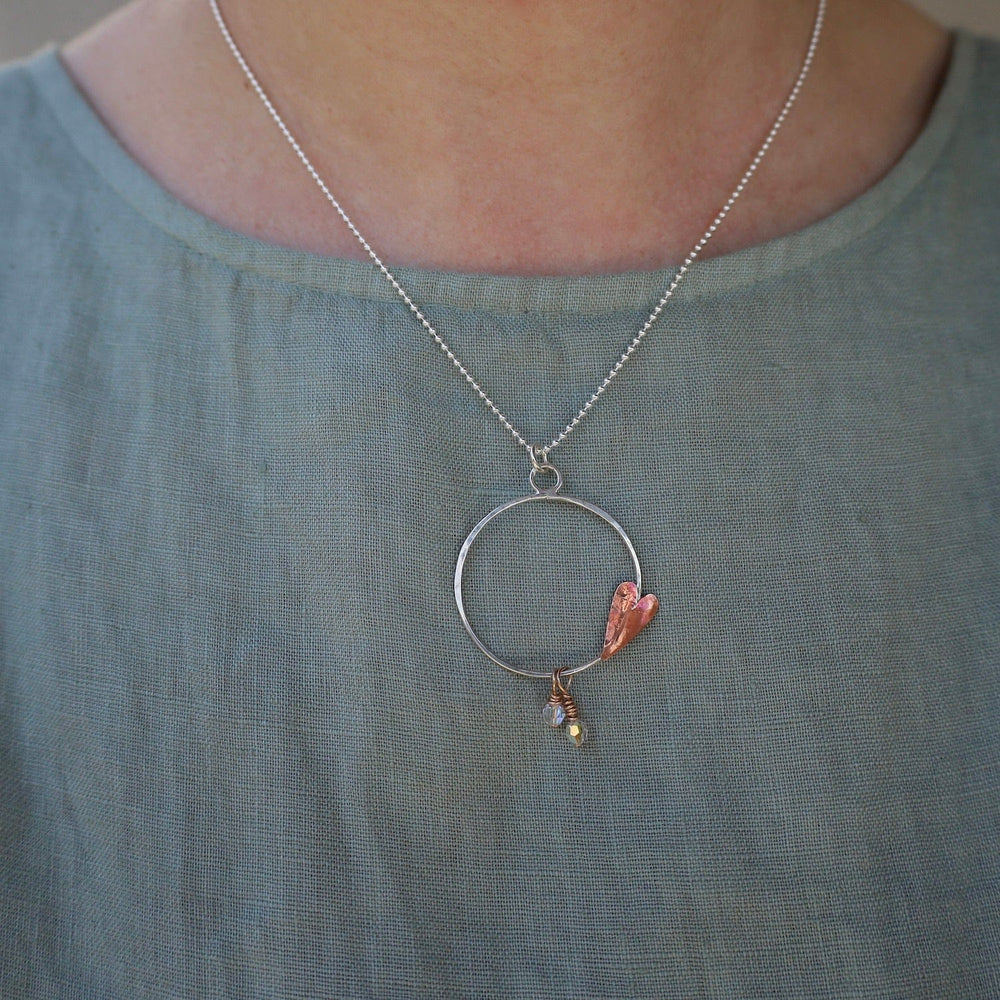 
                      
                        NKL Copper Heart Hoop Necklace
                      
                    